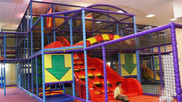 Kids playing on soft play frame at Alley Cats Indoor Play Centre in Coleraine