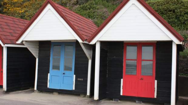 Beach huts on sea front on Curious About Bournemouth trail