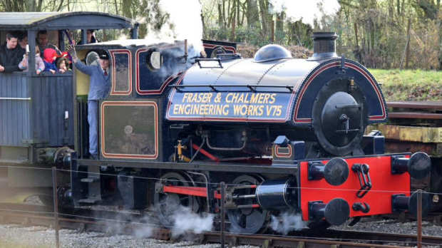 People on steam train at Buckinghamshire Railway Centre in Aylesbury