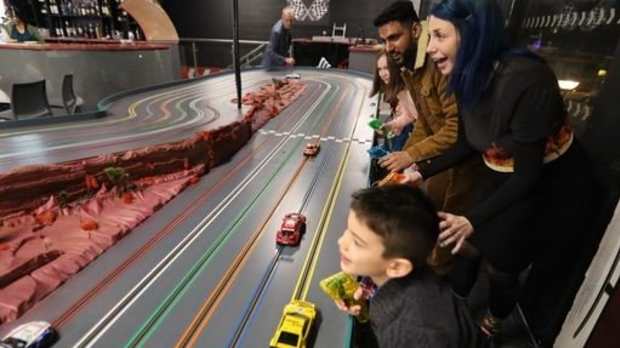 Some kids playing RaceCars in Milton Keynes