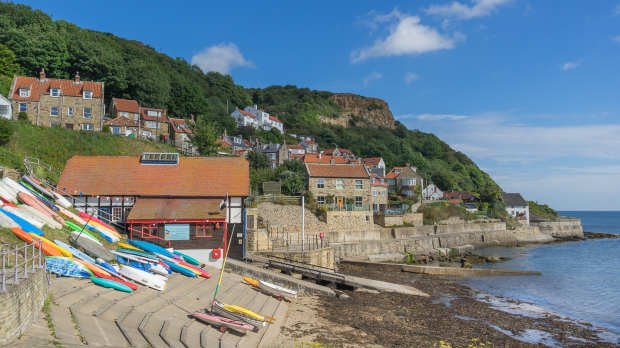 Boats and houses at Runswick Bay in Whitby