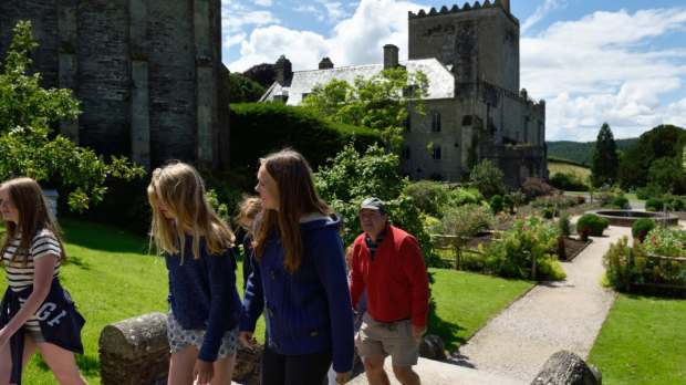 A family walking at Buckland Abbey, photo credit National Trust/John Millar