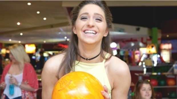 Girl bowling at Bowlplex Nantgarw in Caerphilly