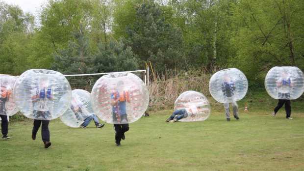 People zorbing at The Adrenalin Jungle in Nottingham