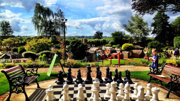 Giant game of chess in garden in Model Town at Wimborne Minster