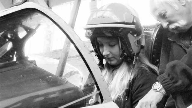 Woman in aircraft at Boscombe Down Aviation Collection in Salisbury