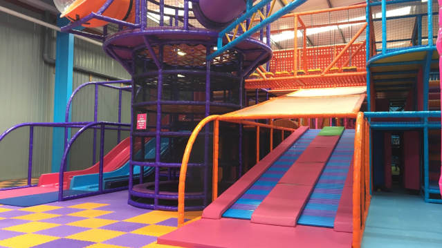 Indoor soft play frame and slides at Funtazia Soft Play in Blackburn