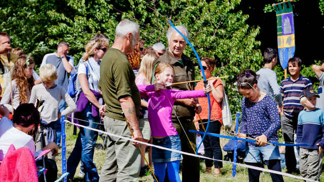 Girl doing archery at The Moors National Park Centre in Whitby