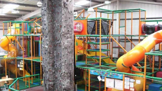 Indoor soft play frame and climbing wall at Adventureland in Walsall