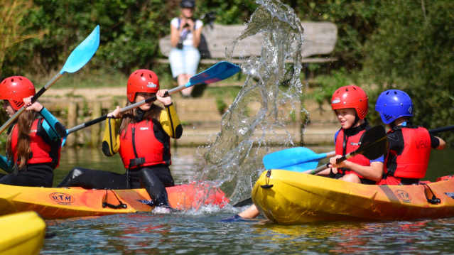 Kids on canoes at Dinton Activity Centre in Hurst