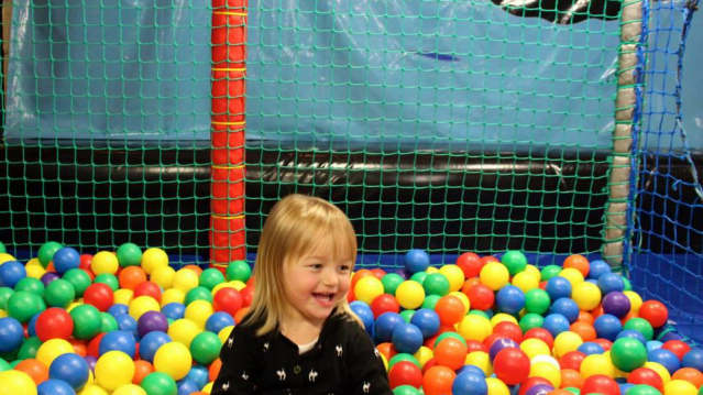 Girl in ball pit at The Kidzone in Berkhamsted