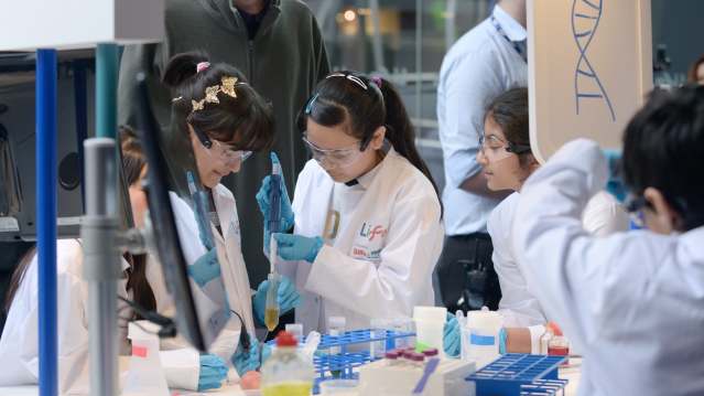 Girls in experiment zone of Centre for Life in Newcastle Upon Tyne
