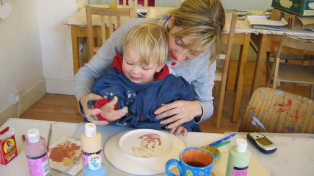 Mum and son making crafts at Doodles Ceramics Workshop in Edinburgh