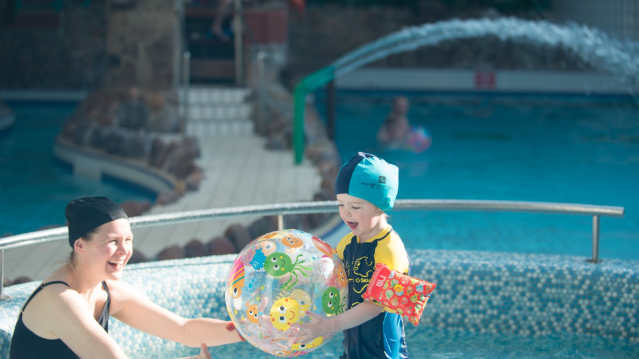 Mum and son playing in swimming pool at Aquadome in Tralee
