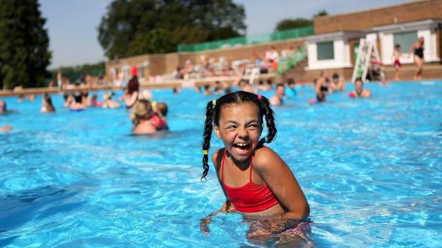 Girl swimming in outdoor pool at Brentford Fountain Leisure Centre