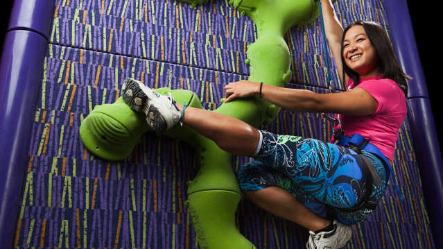 Girl climbing at Clip n Climb Exeter