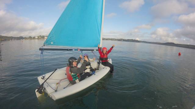 People sailing at Mylor Sailing School in Falmouth