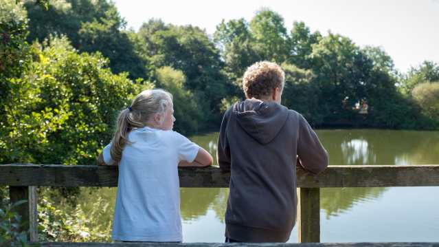Kids by lake at Kingsbury Water Park in Sutton Coldfield