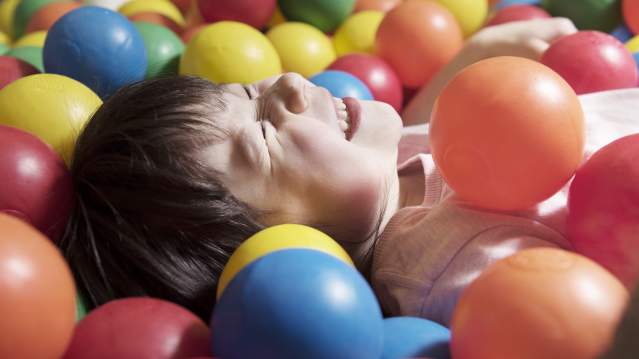 Girl in ball pit at Rheged in Penrith