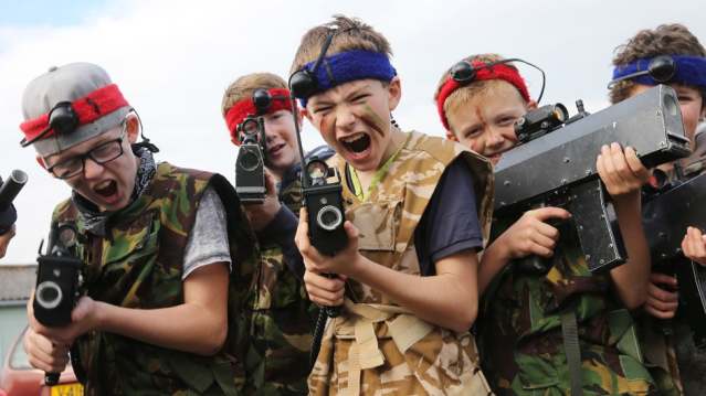 Boys playing laser tag at Lasertag Games venue Edinburgh