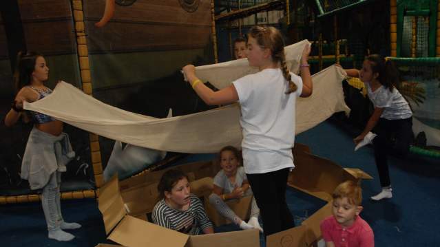 Kids play with cardboard at Adventure Island Playpark in Lowestoft