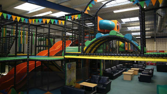 Indoor soft play frame and seating area at Kids2day Indoor Soft Play Centre in Eastleigh