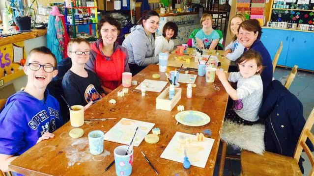 Kids in painting activities at Art and Mor Paint Your Own Pottery in Kenmare
