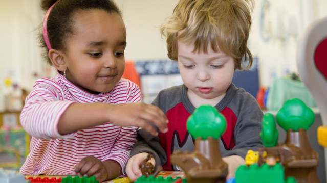 Boy and girl in play area of Wester Hailes Education Centre in Edinburgh