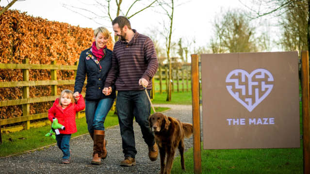 Family and dog at Donkey Sanctuary in Abbey Hey