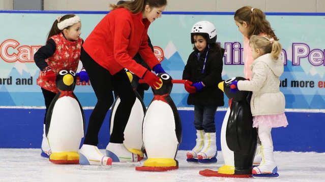 Kids with skate training aids at Planet Ice Coventry
