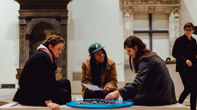 Girl participating in activity at Victoria and Albert Museum in Kensignton