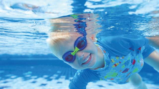 Boy in swimming pool at Aqua Vale Swimming and Fitness Centre in Aylesbury