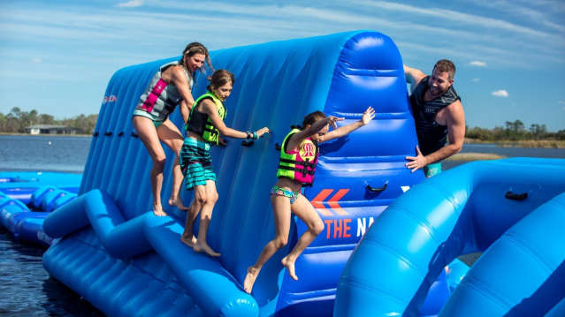 Family on inflatable course at Southlake Aqua Park in St Neots