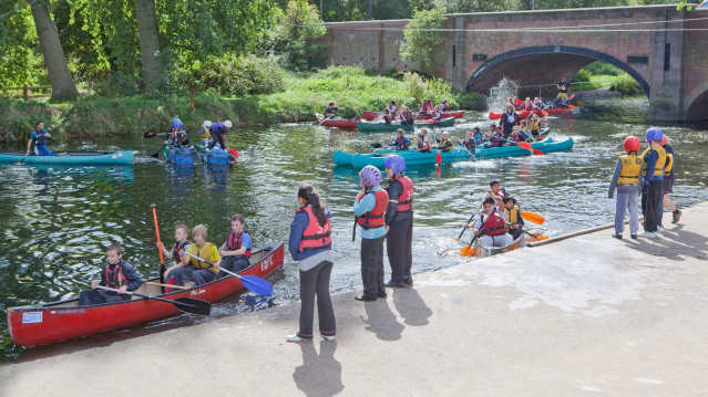 People canoeing at Leicester Outdoor Pursuits Centre