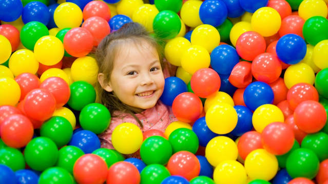 Girl in ball pit at Blue Kangaroo Play and Party Centre in Hull