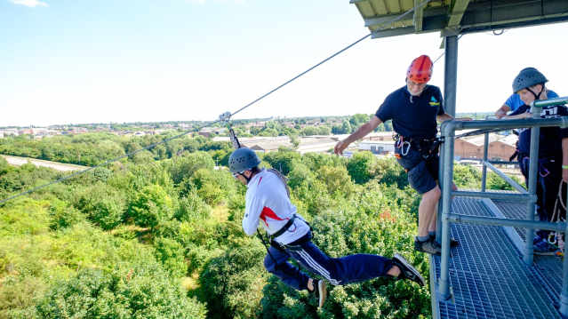 Kids on zip wire at Ackers Adventure in Birmingham