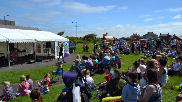Families watching show at Zetland Park in Grangemouth