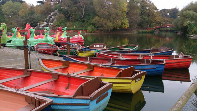 Paddling boats on lake in Peasholm Park in Scarborough