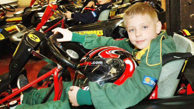Boys in go karts at Teamworks Karting Birmingham