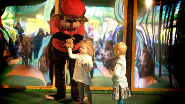 Girls with mascot at Cheeky Monkeys Chorley