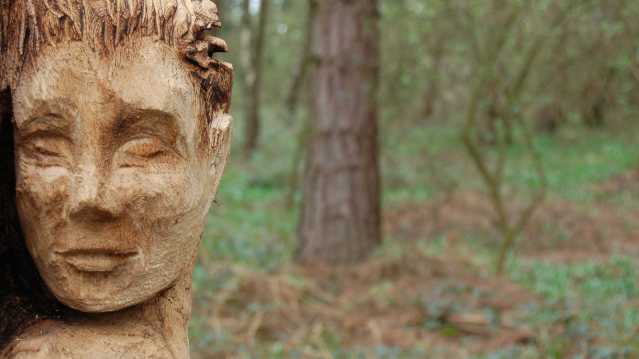 Wooden statue at St Ives Estate Country Park in Bingley