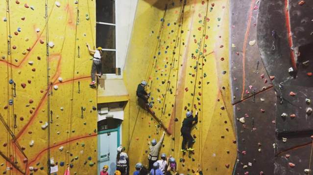 People rock climbing at Dynamic Rock in Swansea