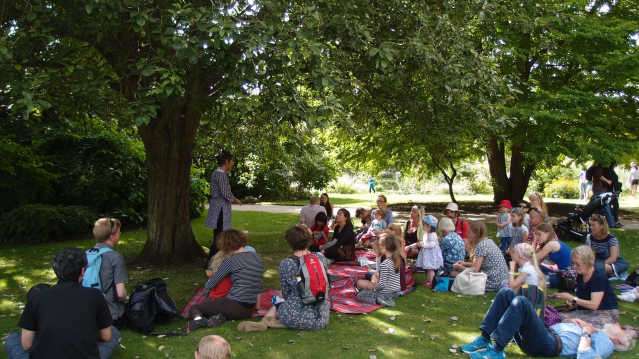 Families listening to speaker at The University of Oxford Botanic Garden