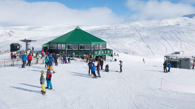 People skiing at Glenshee Ski Centre in Braemar