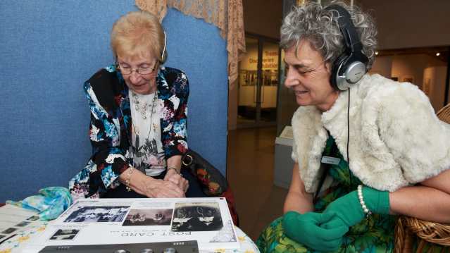 Women with audio tour guide at Banbury Museum