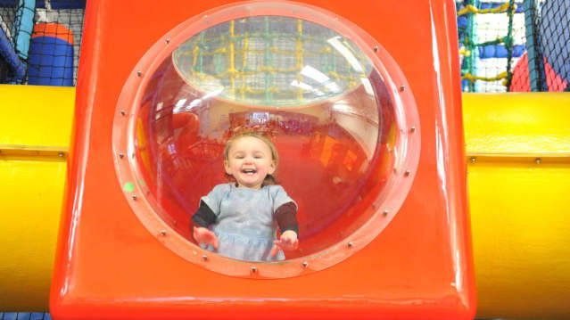 Girl on soft play frame at Rugrats and Half Pints Indoor Play Centre in Banbury