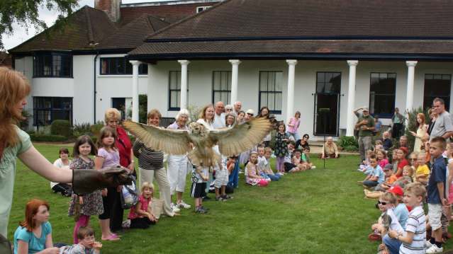 An event takes place on the grounds of Haslemere Educational Museum