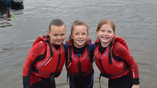 Girls in lake at Hollingworth Lake Activity Centre in Rochdale