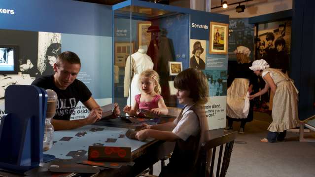 Family playing game at The People History Museum in Manchester