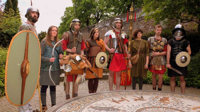 Staff in costumes at Dewa Roman Experience in Chester
